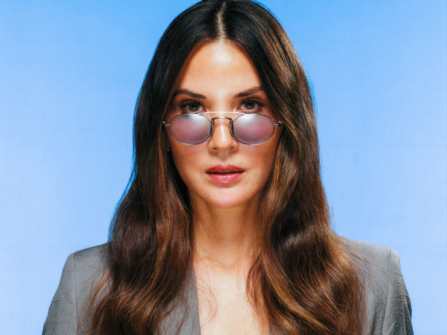 Image may contain Olivia Munn Blazer Clothing Coat Jacket Face Head Person Photography Portrait and Adult
