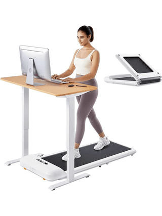 Image may contain Furniture Table Desk Adult Person Computer Hardware Electronics Hardware Monitor and Screen