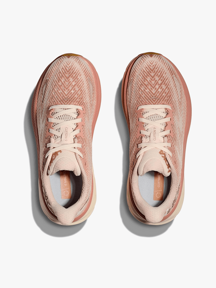 Clifton 9 sneakers in branded soft mauve and coral color way on light gray background