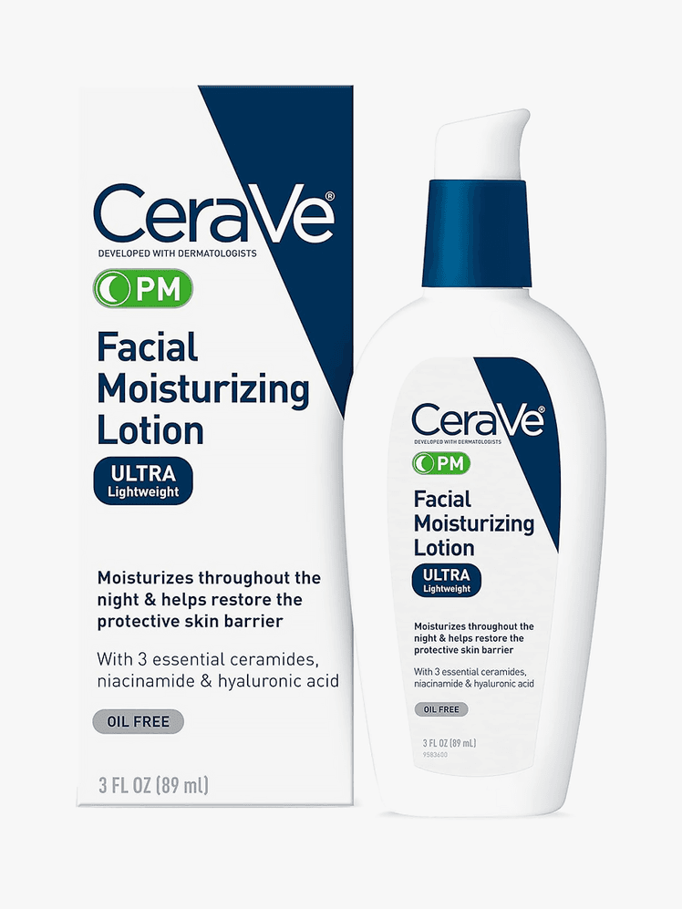 Facial Moisturizing Lotion PM in branded white and blue bottle with pump next to branded box packaging on light gray background