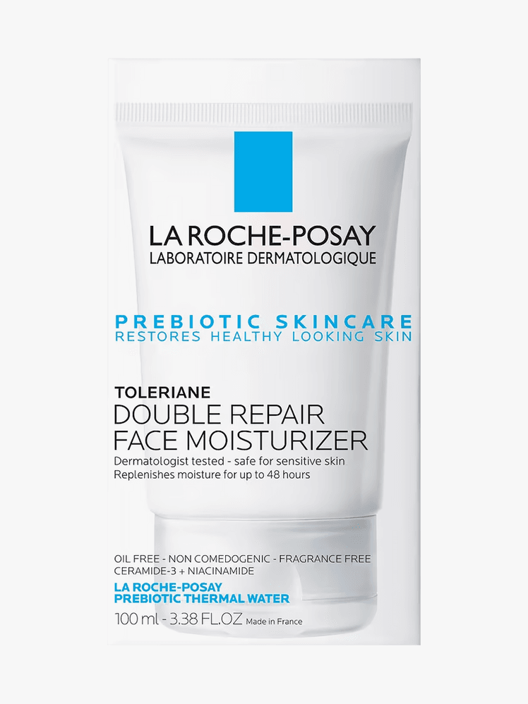 Toleriane Double Repair Face Moisturizer in branded white tube with cap on light gray background