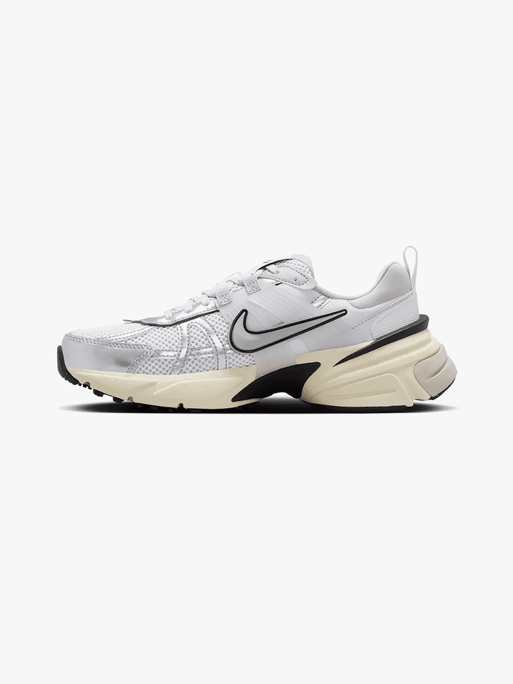 V2K Run sneakers in silver black and white color way on light gray background